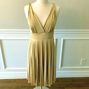 Soprano gold sleeveless pleated dress
